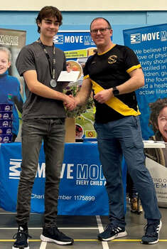 This photo is of Edwin Lancaster at the prize-giving. It was taken by Hannah Moon