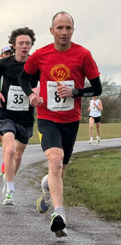 This photo is of Ian Thomas. It was taken by Stratford AC
